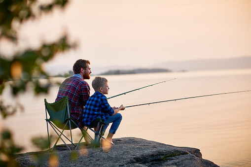 Image of father and son fishing